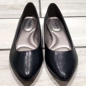 Coach and four loafers.